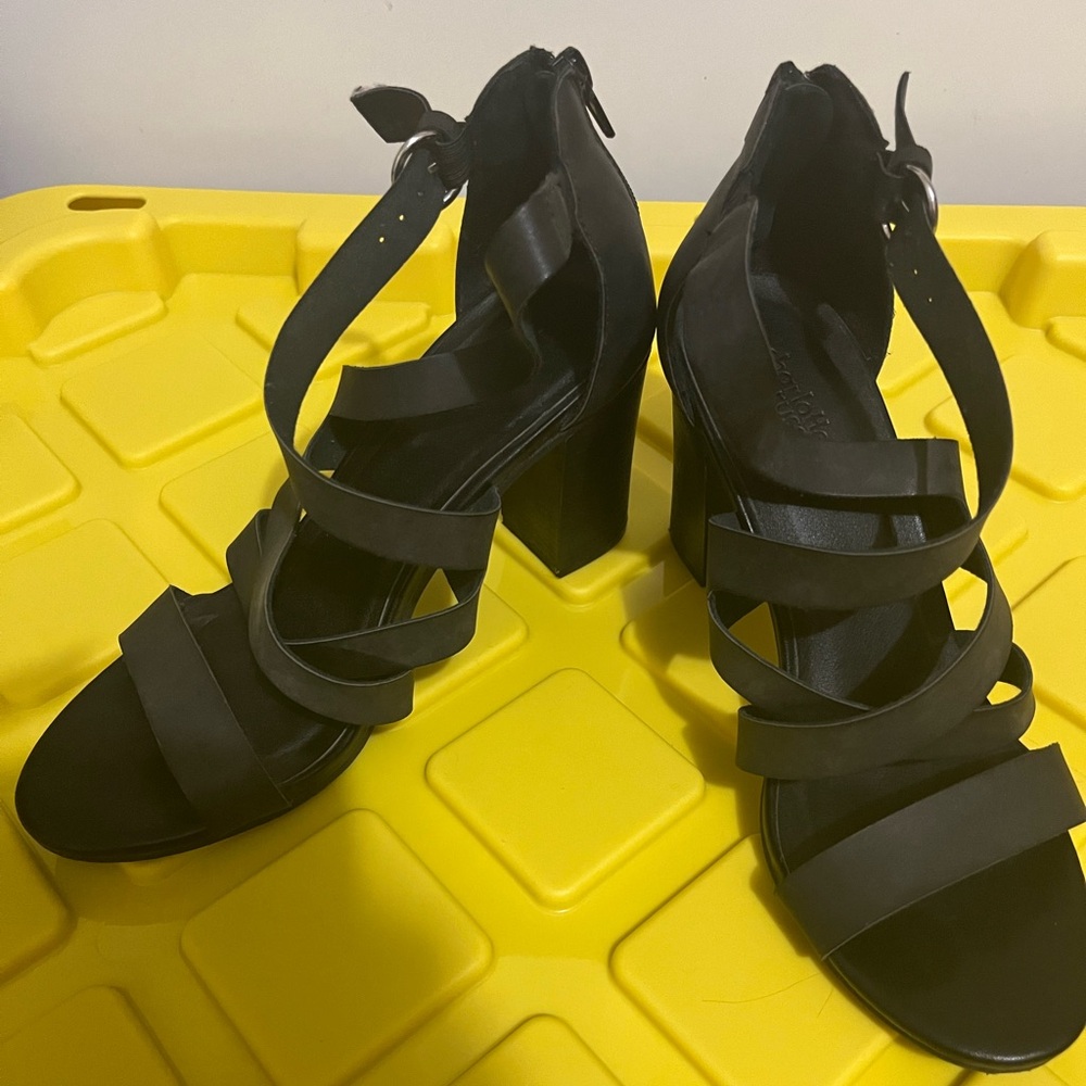 Black high heels .